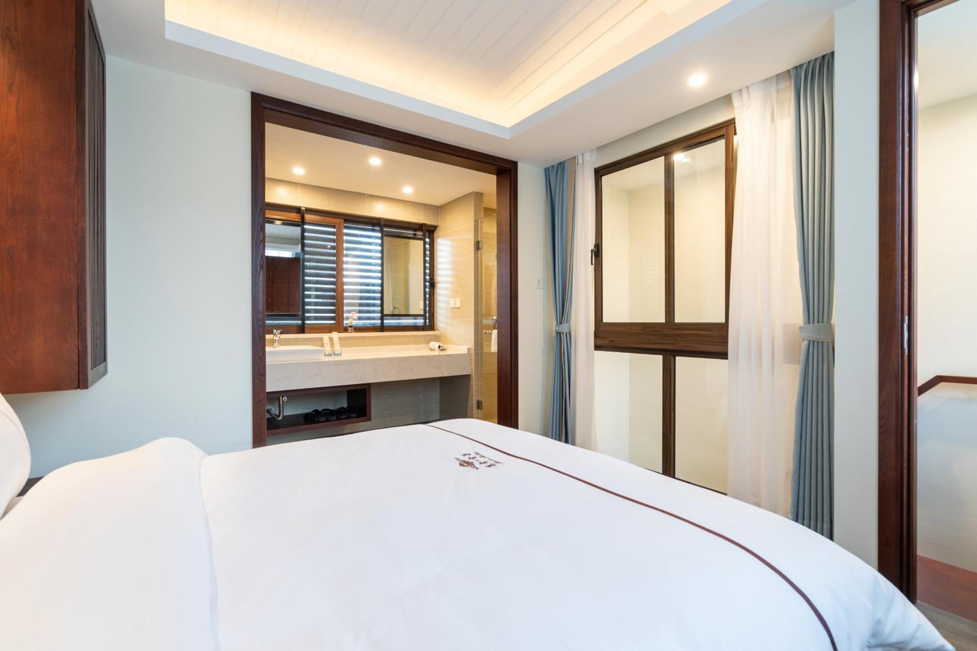 Iccssi Villa Haitang Bay Sanya Extérieur photo